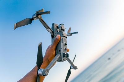 man holding drone